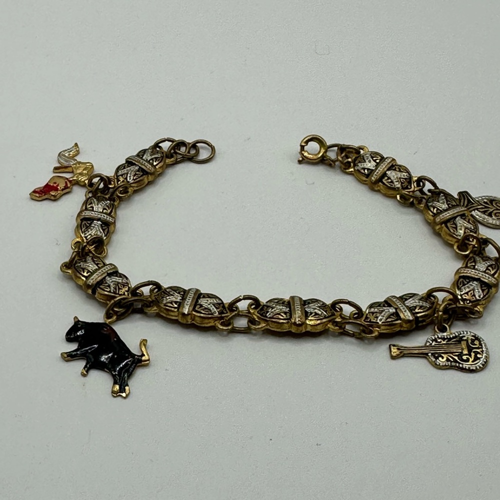 Vintage Damascene Charm Bracelet with Spanish-Themed Charms